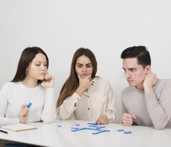 front-view-friends-playing-domino